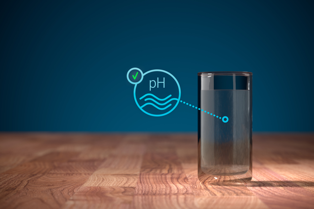 Optimal drinking water pH concept with drinking water in glass. Drinking water and check box representing optimal acidity of water.